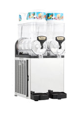 A commercial Icetro America frozen beverage dispenser featuring two transparent tanks with pull levers for easy slush machine operation. The silver unit has black accents, colorful fruit images on top, and ventilation on the left side.