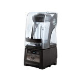 A BPA-Free Quick & Quiet Blender, this black countertop unit features a transparent sound enclosure, digital control panel, and clear pitcher for reduced noise. The Vitamix-inspired base includes buttons and a display screen, all set against a white background.