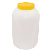 A large, translucent white TableCraft PourMaster Backup Mix Bottle, 1 gallon capacity, with vertical ridges on the upper portion and a flat, round, bright yellow screw-on lid. The cylindrical jar features slightly curved sides and no visible markings.