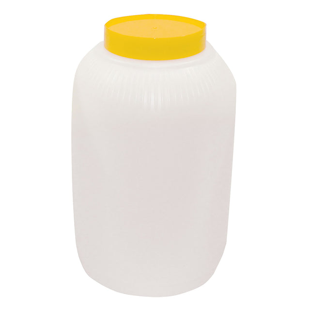 A large, translucent white TableCraft PourMaster Backup Mix Bottle, 1 gallon capacity, with vertical ridges on the upper portion and a flat, round, bright yellow screw-on lid. The cylindrical jar features slightly curved sides and no visible markings.
