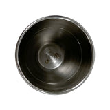 A top-down view of an empty stainless steel jigger with a smooth, shiny surface and three small dimples at the bottom, set against a white background. The inside of this dishwasher safe cup is clean and well-polished.