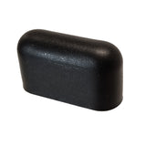 A small, black, rectangular plastic or rubber cap with rounded edges and a matte finish, shown against a white background. This TableCraft Replacement Handle Stop is designed as a protective cover for the end of a Commercial Juice Press handle or rod.
