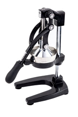 A black and silver TableCraft Products manual juice press with a sturdy metal frame, a vertical lever arm with a black handle, round metal pressing plate, and U-shaped base for stability. The juicer is shown upright on a white background.