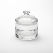 A clear jar with lid, this 35 oz jar is cylindrical with smooth, transparent glass and a matching round lid featuring a knob handle. It sits on a white background, its clarity enhanced by even lighting and free from any labels or markings.