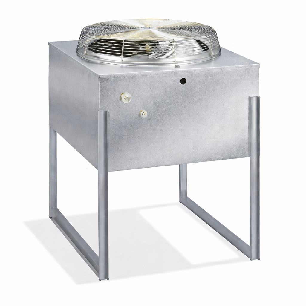 A square metal industrial air-cooled condenser unit stands on four legs. The top features a large, protective wire grille over a yellowed fan blade. The front panel has two round control knobs and a small circular hole, all with a metallic, slightly textured finish.