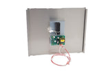 A metal rectangular panel with a mounted green circuit board featuring electronic components, a yellow transformer, and a black rectangular component above the board—part of the Manitowoc Touchless Dispensing Kit—with red and white wires loosely coiled at the bottom.
