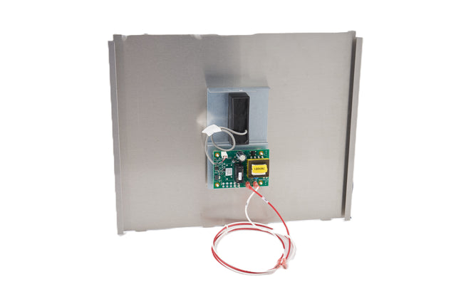 A metal rectangular panel with a mounted green circuit board featuring electronic components, a yellow transformer, and a black rectangular component above the board—part of the Manitowoc Touchless Dispensing Kit—with red and white wires loosely coiled at the bottom.