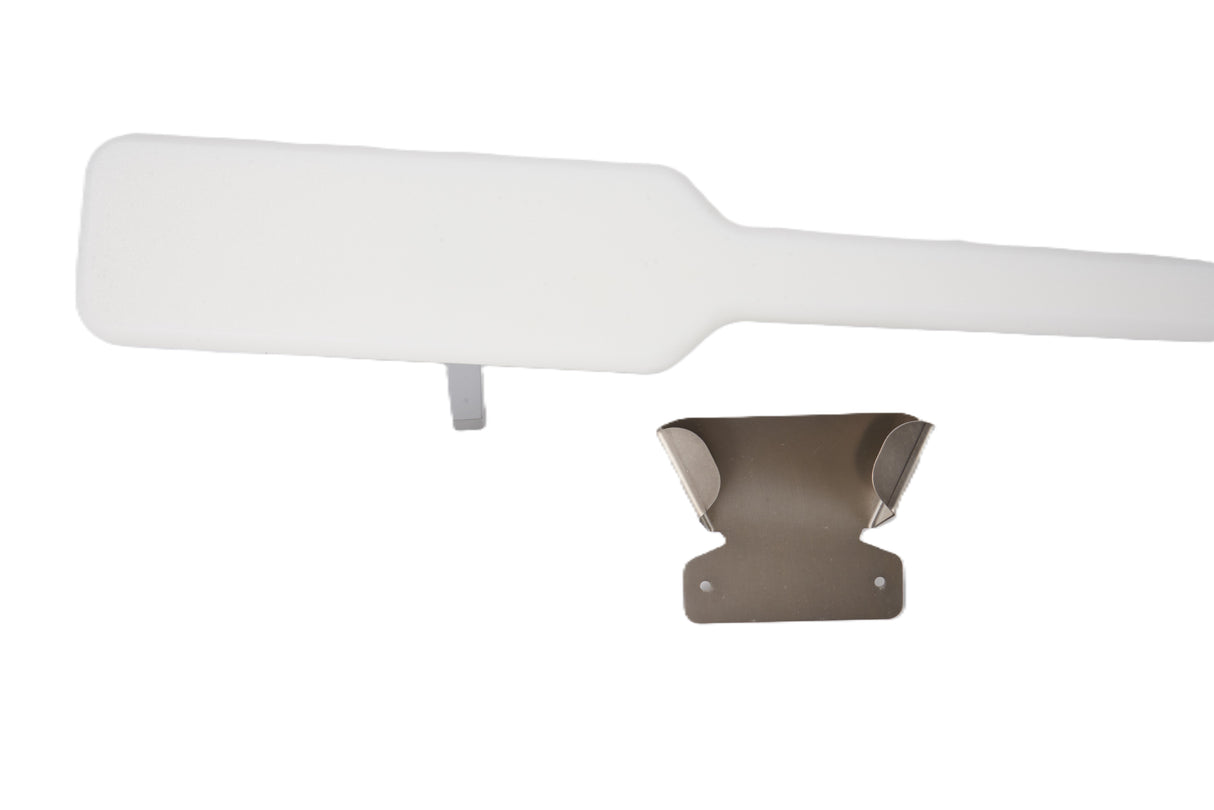 A white, rectangular Manitowoc ice paddle with a handle and a small NSF metal bracket beside it, both set on a white background. The paddle is angled diagonally, while the metallic bracket has curved sides and two screw holes at the bottom.