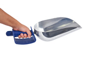 A person’s hand holds a large, shiny Manitowoc cast aluminum ice scoop with a wide, deep bowl and a blue ergonomic handle, isolated on a white background. The scoop appears suitable for handling bulk materials like grain, pet food, or ice.