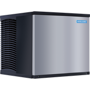 A large, box-shaped commercial Ice Kube Machine with a stainless steel front panel, black sides, and a grated air vent on the left. This self-contained condenser unit features the KOOLAIRE brand name on a blue label in the top right corner.