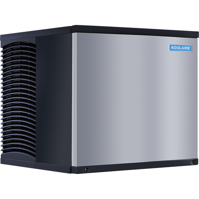 A large, box-shaped commercial Ice Kube Machine with a stainless steel front panel, black sides, and a grated air vent on the left. This self-contained condenser unit features the KOOLAIRE brand name on a blue label in the top right corner.