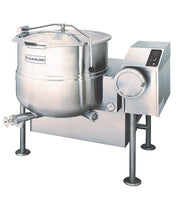 A large industrial stainless steel 40-gallon steam jacketed kettle with a closed lid, mounted on four legs. It features a side control panel with buttons and a display, pressure gauge, and front spout for draining. Brand label reads Cleveland—ideal commercial kitchen equipment.