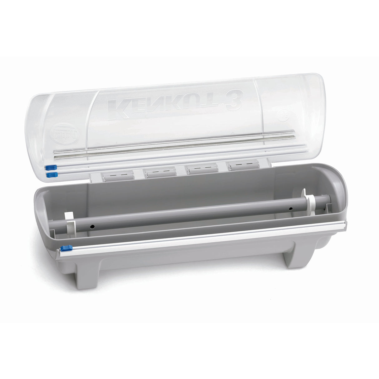 A gray, rectangular KenKut dispenser with a clear, hinged lid is open to reveal a slot for film or roll insertion, a cutting mechanism, and rollers. The dishwasher safe lid is embossed with “KENKOL,” and compatible with Replacement Slide Cutter Blades.