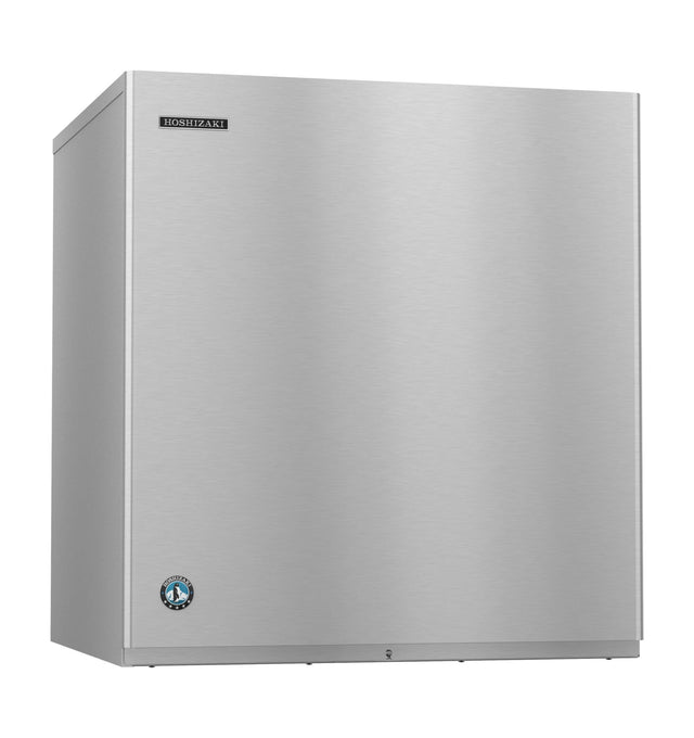 A large, stainless steel Hoshizaki cube-style ice maker with a smooth front surface. The Hoshizaki logo is in the top left corner, and a blue certification sticker sits in the bottom left. The machine stands against a plain white background.