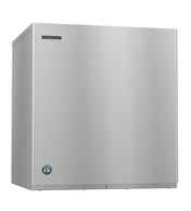 A Hoshizaki Cube-Style Ice Maker with a stainless steel body, smooth flat front panel, brand logo on the upper left, and a blue circular certification sticker on the lower left stands against a white background.