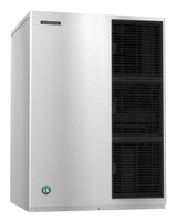 A large, stainless steel Hoshizaki ice maker with a rectangular shape. The left side is solid metal, while the right side features three stacked black vent grilles. The brand logo and label are on the upper left front panel. Produces crescent cube ice.