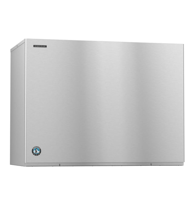 A large, rectangular, stainless steel commercial ice maker with a smooth, flat front and minimal seams. The clean, reflective surface features a small blue and black circular logo in the lower left corner. Produces Crescent Cube ice and is air-cooled.