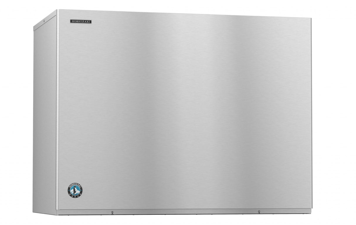 A large, rectangular stainless steel stackable ice maker with a smooth front panel and a small blue logo in the bottom left corner. The reflective surface and cube-style design give it a minimalist, industrial appearance.