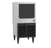 A commercial ice maker with a stainless steel body, black front panel, and vented lower section. It stands on four black legs, has a large rectangular door for ice retrieval, and produces crescent style cubes. The unit is compact, industrial, and ADA compliant.