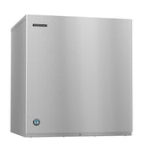A stainless steel Cube-Style ice maker with a rectangular shape, smooth flat front, and minimal visible controls. The Hoshizaki brand logo is on the upper left, and a circular blue certification sticker is on the lower left corner.