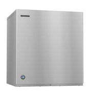 A stainless steel Cube-Style ice maker with a rectangular shape, smooth flat front, and minimal visible controls. The Hoshizaki brand logo is on the upper left, and a circular blue certification sticker is on the lower left corner.