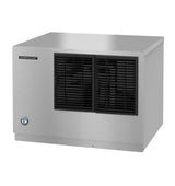 A stainless steel Hoshizaki commercial Cube-Style ice maker features a rectangular shape with two large black vented panels on the front. The brand label is on the upper left, with a round blue and white certification badge on the bottom left corner.