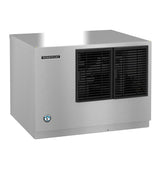 A stainless steel Hoshizaki Cube-Style Ice Maker with a rectangular shape, black ventilation grilles, and brand and certification labels on the smooth, reflective front panel. Built for commercial use.