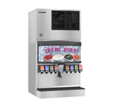 A commercial Hoshizaki soda fountain machine with multiple drink options and a crescent cube ice maker. The front displays images of various sodas, and above, a sign reads chill out...drink up! against an icy backdrop. Silver finish with colorful push levers.