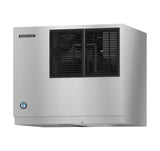 A stainless steel Hoshizaki ice maker with a rectangular shape features black ventilation grilles on the front and a small blue circular logo on the lower left. The brushed metal surface highlights its durable, cube-style design against a white background.