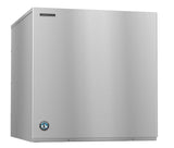 A cube-style Hoshizaki Ice Maker with a rectangular stainless steel body and smooth metal surface features the Hoshizaki logo on the upper left and blue emblem on the lower left, set against a plain white background.