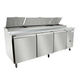 A large commercial stainless steel refrigerated prep table with three doors, top-open compartments with lids, a cutting board surface, and wheels for mobility. The sleek, industrial design is ideal for restaurant kitchens or as a pizza prep table.