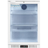 A white Empura LG-138HA-W countertop refrigerator merchandiser with a glass door, two wire shelves, interior LED lighting, and a digital control panel. The fridge is empty and clean, with a vent and fan at the top of the back wall.