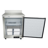 An Empura Refrigeration undercounter reach-in refrigerator with an open door reveals a white interior, one wire shelf, and a lower metal compartment. The smooth white door features circular indents, and the unit sits on small wheels.