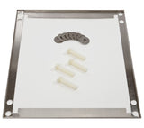 A metal plate with four corner holes lies on a white surface. Centered are four white cylindrical spacers—part of a Scotsman Undercounter Floor Mount Kit—and a row of ten metal washers in an arc above the spacers, suited for ADA countertops.