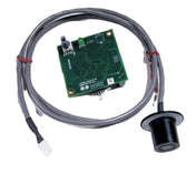 A green circuit board with electronic components sits beside a long gray cable, partially secured with red ties, designed for Scotsman Prodigy Vari-Smart Ice Level Control systems to monitor and maintain precise ice bin levels.
