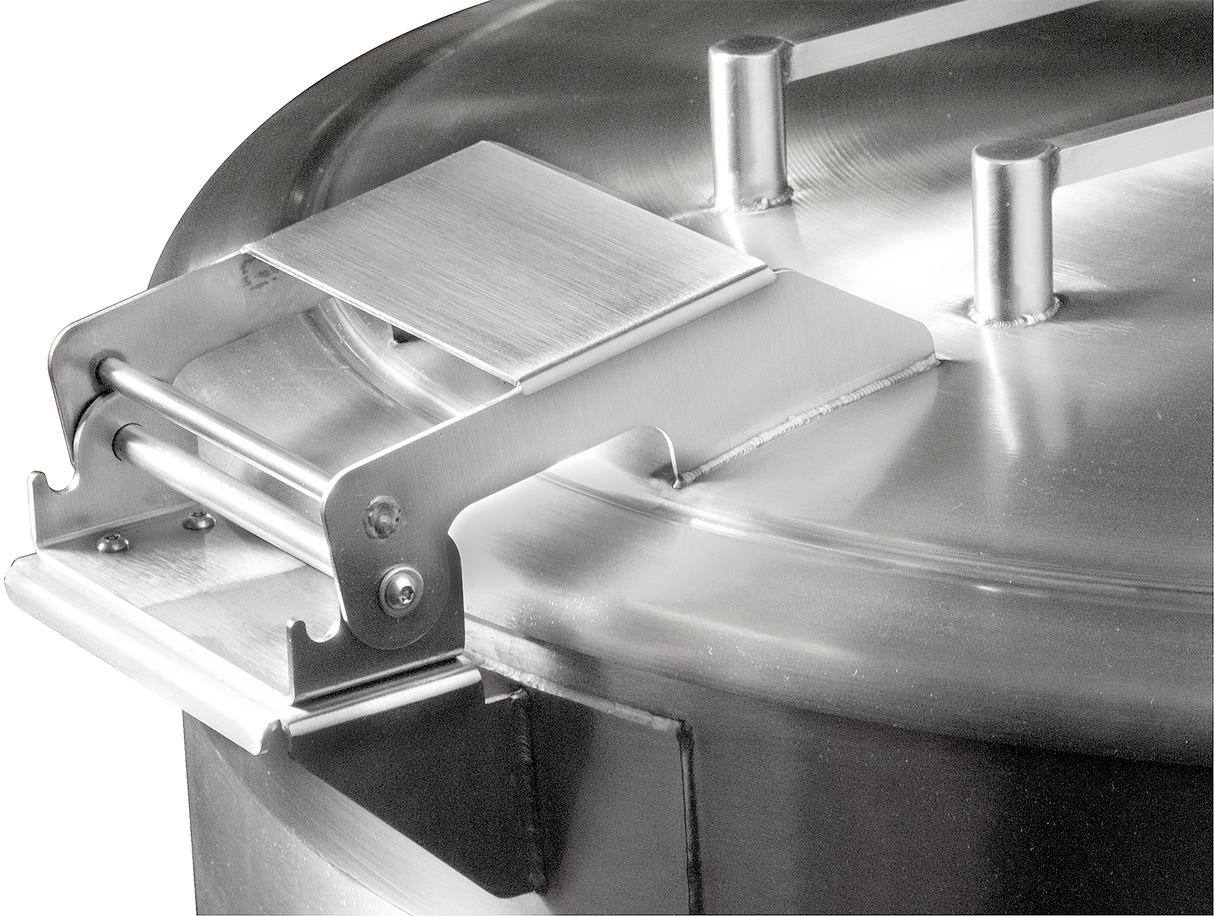 A close-up photo of a large stainless steel pot with a spring assist cover. The lid features a sturdy, industrial-style latch and handle mechanism, ensuring a secure closure. Its slightly reflective surface highlights both the pot’s durability and functionality.