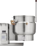 A large industrial stainless steel tilting kettle with a 12-gallon capacity features a round body, pressure gauge, brass valves, and an attached control box on the left. A long metal handle extends upward on the right, ideal for commercial food preparation.