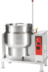 A large industrial tilting kettle with stainless steel construction features a red control panel, attached faucet, and lever handle, all mounted on a metal stand. The brand “Vulcan” appears on the lower right of the control box.