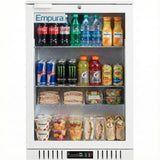 A refrigerator merchandiser stocked with soda cans, bottled water, and juice on top; sports drinks and iced tea in the middle; wraps, sandwiches, salads, fruit cups, and Chobani yogurt at the bottom. The Empura LG-138HA-W is perfect for organized display.