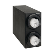 A black rectangular lid dispensing cabinet with two circular compartments on the front, each holding a roll of disposable gloves. Transparent covers reveal the gloves inside, and DISPENSE-RITE is labeled on the top front corner.