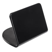 A black, rectangular Buffet Tent with rounded edges stands upright on an oval base. Made from smooth melamine, its simple and modern design by TableCraft is photographed against a white background.