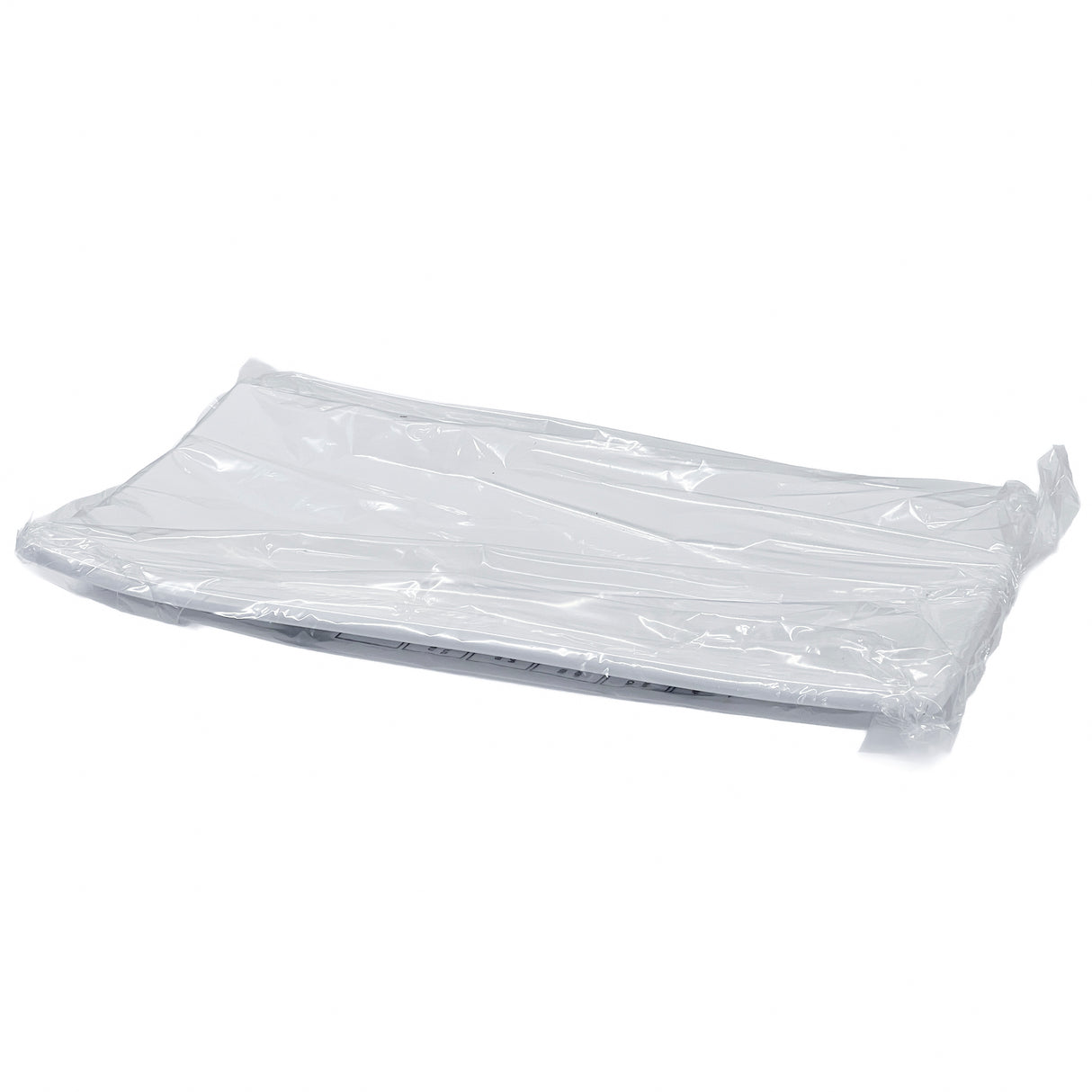 A stack of white Frostone Collection Dish trays, made from durable melamine, is wrapped in transparent plastic packaging on a plain white background. The plastic covering is slightly wrinkled and tightly sealed around the rectangular stack.