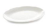 A large, oval-shaped white Frostone Collection melamine tray with a subtle, textured dimpled pattern and a slightly scalloped rim, photographed on a plain white background. The dishwasher safe tray is empty and angled slightly to the left.