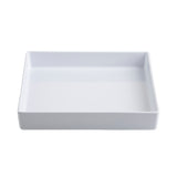 A rectangular, shallow, white ceramic tray with straight sides and a smooth, glossy surface, shown against a plain white background. Its minimalist design pairs well with the Contemporary Collection Bowl for a modern table setting.