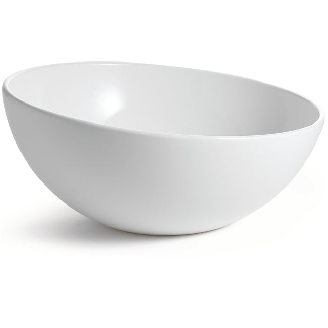 A plain, smooth white melamine bowl from the Sierra Melamine Collection sits on a white surface, photographed at an angle that highlights its round, deep interior and slightly glossy finish. This dishwasher safe bowl casts a soft shadow to the left.