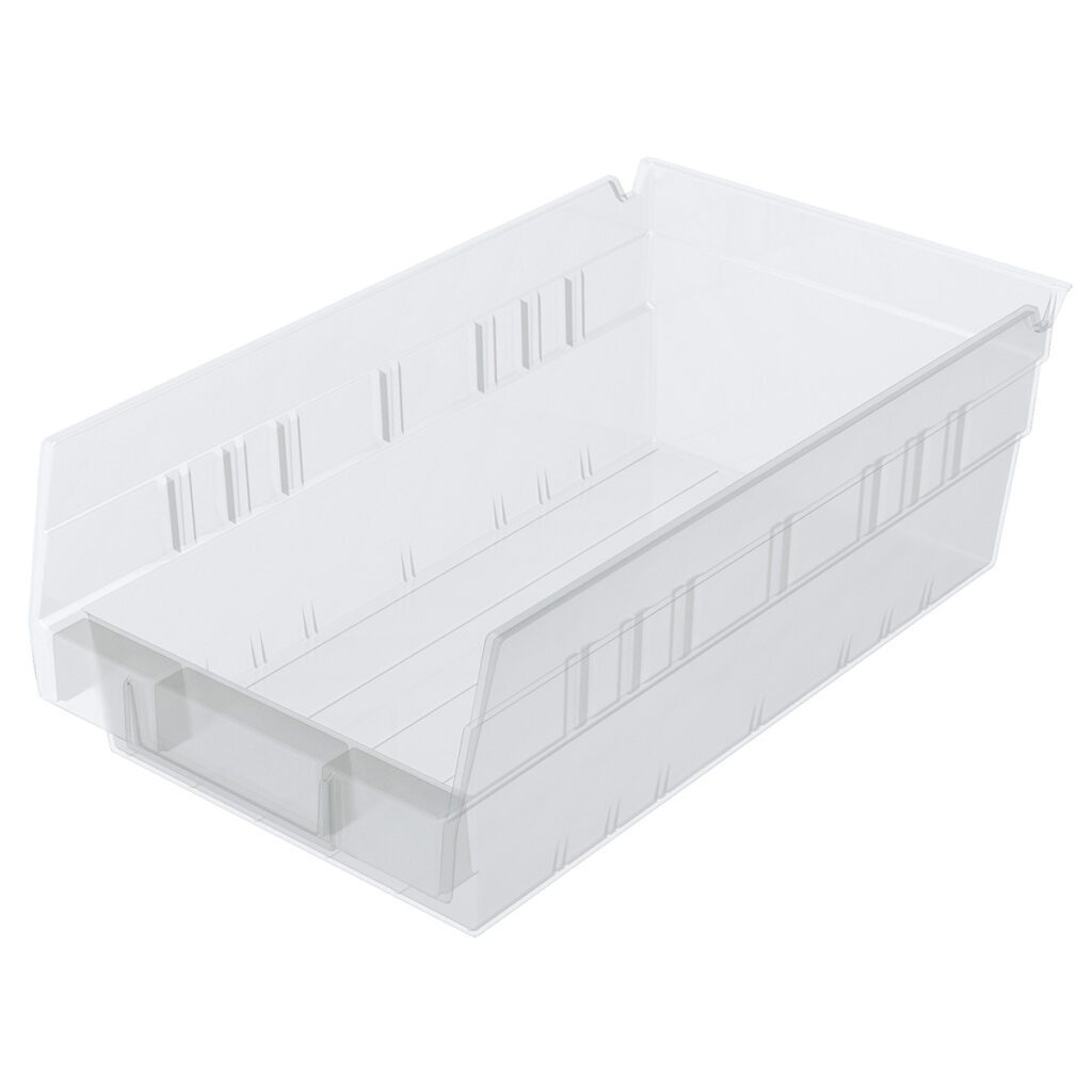A clear Shelf Bin with high sides and an open front for easy access and organization. Designed for nesting, it features slightly raised lines along the sides and interior to provide added structure and durability.