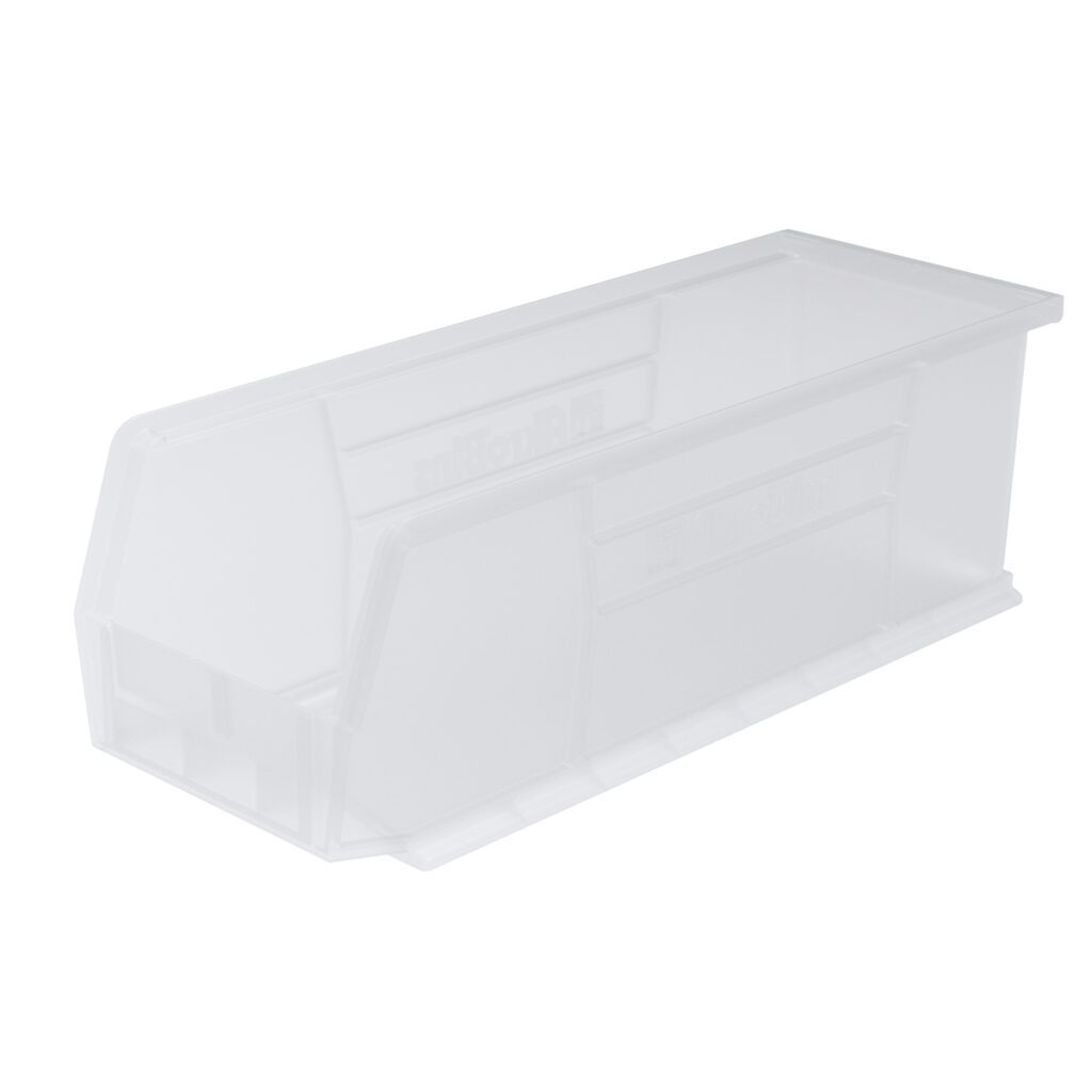 A translucent, rectangular clear storage bin with a slightly slanted front opening. The bin features reinforced side panels and a flat bottom, perfect as a supply bin for organizing small items while keeping contents visible.