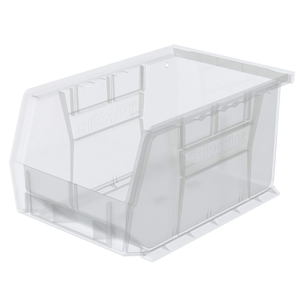 A clear stacking bin with a slanted open front for easy access. This transparent Supply Bin features reinforced sides, bottom grooves, and a small hole on the back for optional wall mounting. The bin is empty and perfect for organized clear storage.