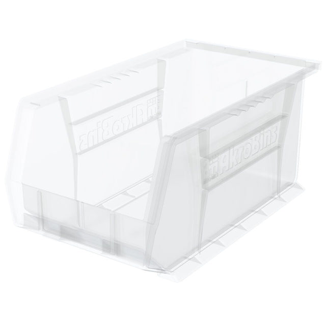 A clear storage bin with an open front, ribbed sides, and a flat bottom. The word “AkroBins” is embossed on the side. Ideal for stacking bins, this empty container is angled on a white background.