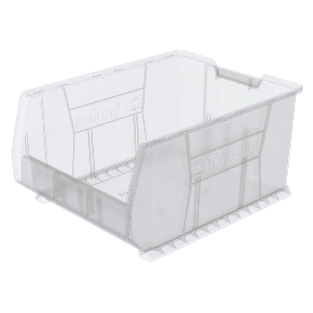 A clear Large Supply Bin with a wide open front for easy access. It features solid sides, a ribbed base for stability, and molded grooves for stacking or sliding onto shelves. The word AkroBins is embossed on the side.